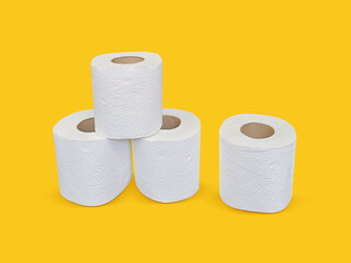 Toilet paper roll on yellow background