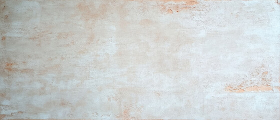 Fototapeta premium Worn wall with subtle textures and traces of old plaster, creating rustic feel