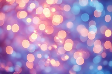Fototapeta premium A soft-focus background of colorful bokeh lights in pink and blue hues.