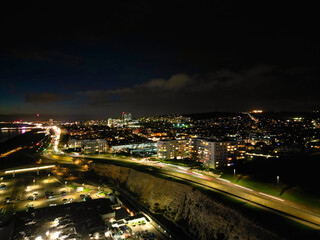 Aerial View of Illuminated Brighton Beach and Ocean City and British Tourist Attraction of East Sussex, England Great Britain During Night. Drone's Camera Footage Captured on December 3rd, 2024