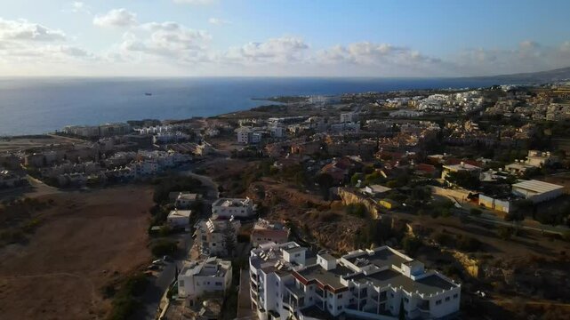Aerial view of Paphos cityscape, Cyprus. Architecture and urban city with buildings and streets. Mediterranean sea. High quality footage 4k