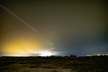 stars in the night sky with a strange light
