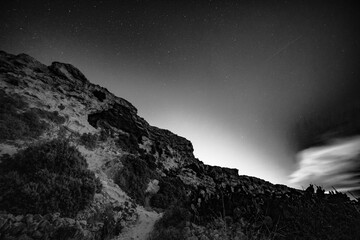Black and white Cliff at nite in Gozo, Malta