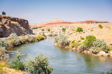 The Bighorn River is a tributary of the Yellowstone, approximately 461 miles long, in the states of Wyoming and Montana in the western United States.
