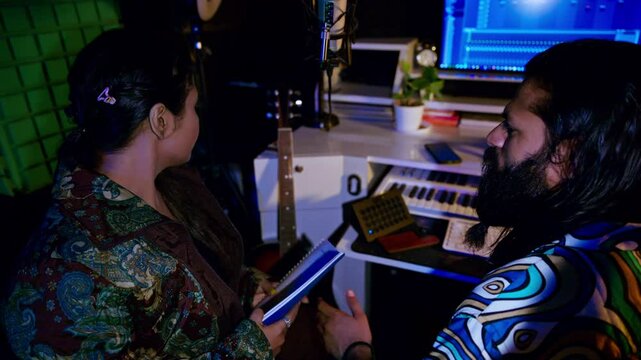 Musicians Collaborating in Recording Studio