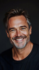 Fototapeta premium Smiling Caucasian adult man portrait with a sincere expression on a clean backdrop