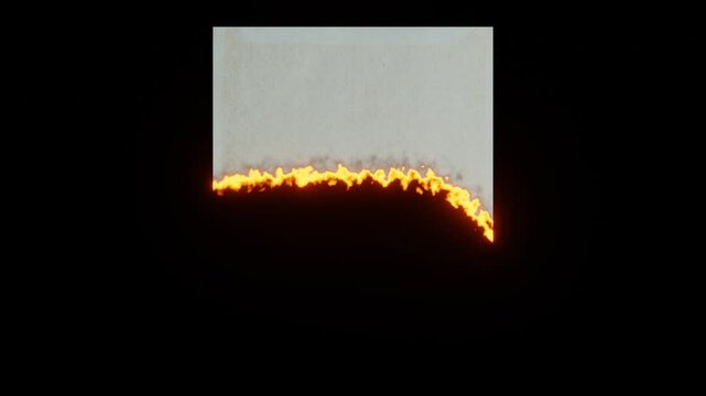 Burning blank old page using for template,Burning old paper animation on black background