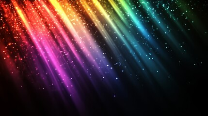 Obraz premium A vibrant display of colorful light rays with sparkling particles set against a dark background, creating a mesmerizing visual effect.