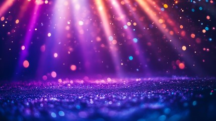 A vibrant, colorful background featuring beams of light and shimmering particles, creating a festive and celebratory atmosphere.