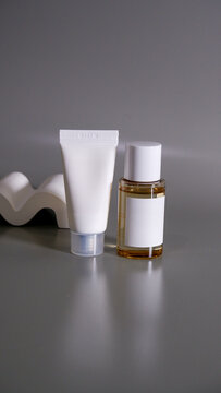 plain skincare bottle mockup set with minimalist grey studion scene background