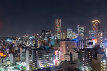 Fototapeta premium sweet sunset winter and light illumination from Cityscape of Yokohama city, Skyline and office building and downtown in Minatomirai Area, Yokohama city port, Kanagawa, Japan