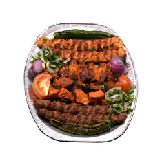 Mixed grill large platter with tomato, onion and green chilli in a plate