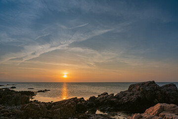 Tranquil Seaside with Glowing Sunset