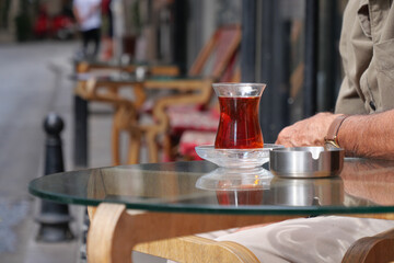 Traditional turkish tea on white table .