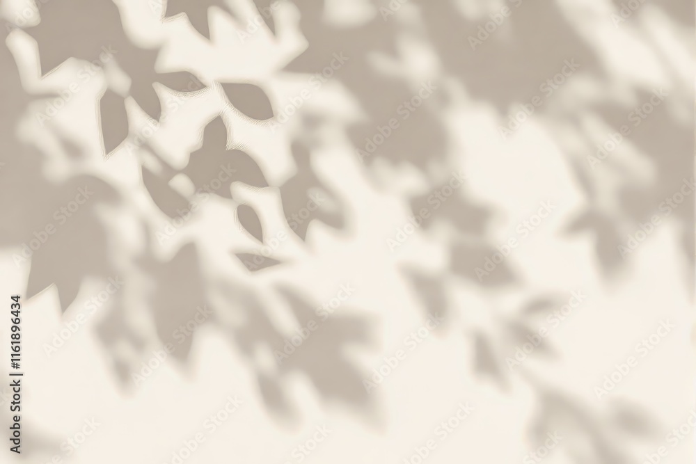 Poster abstract blurred shadows of leaves on a beige background, creating a soft and natural artistic effec