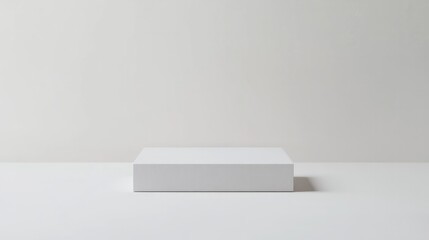 A white box is on a white surface