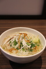 Vietnamese cuisine: pho ga (rice noodles with chicken)