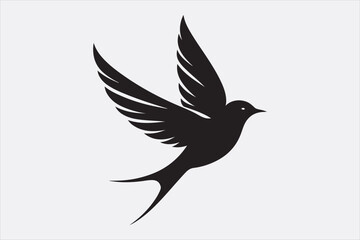 A black silhouette of a flying swallow.