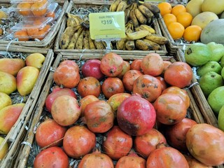 Decorated commercial various fruits selling shop or grocery supermarket display inside modern shopping mall at Kolkata.