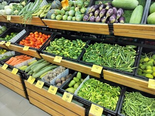 Decorated commercial vegetable selling shop or grocery supermarket display inside modern shopping mall at Kolkata.