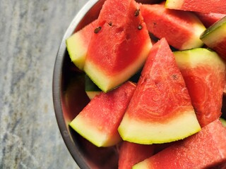 Red delicious fresh Watermelon pieces chopped and served for eating. Large edible fruit. The sweet,...