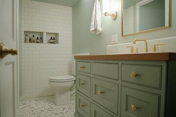 
A Japandi-style restroom featuring a flush toilet with light oak wood accents