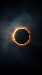 Obraz premium A stunning view of a solar eclipse with a darkened sun surrounded by bright solar corona against a deep blue sky.