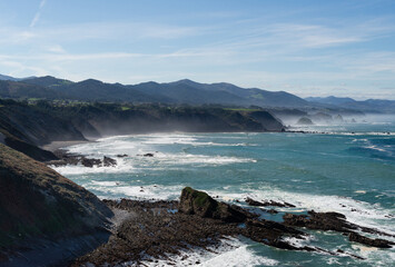 ocean view with fog, swash and spindrift
