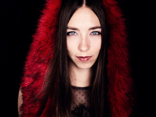 Beautiful brunette wearing fur jacket