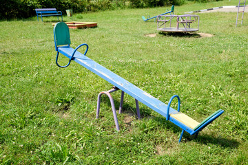 Children's rocking chair on the playground.