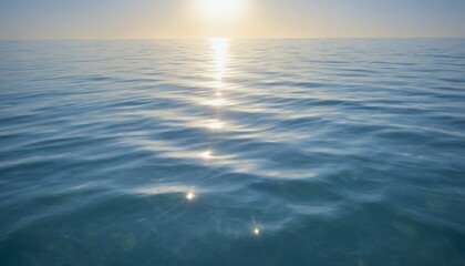 Obraz premium Gentle ocean ripples under a bright sky