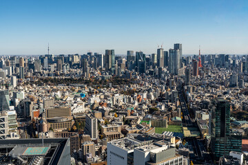 View of Tokyo cityscape including Tokyo Sky Tree and Tokyo Tower   seen from Shibuya Sky building