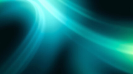 Abstract turquoise and green light trails flowing on dark background