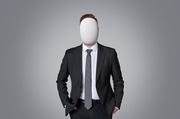 Man in formal attire with blank oval-shaped face mask on white b