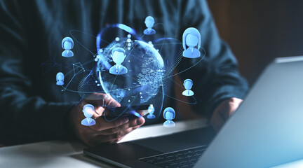 Digital networking concept with icons of people and technology on a dark background.