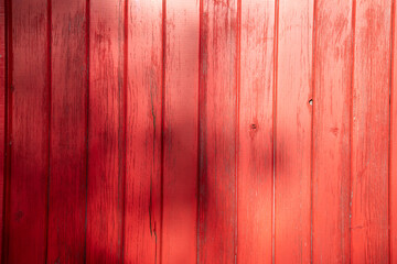 red orange wooden wall fence texture for natural background with shadows wood planks facade