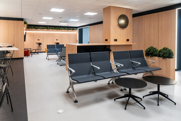 A large room with a lot of chairs and tables