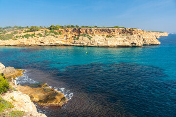Breathtaking turquoise waters of cales de mallorca in manacor, spain