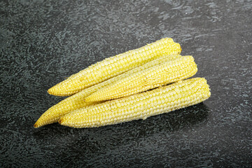 Raw sweet baby corn heap