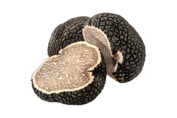 Fresh black truffles isolated on white transparent background, great for culinary and gourmet themes.