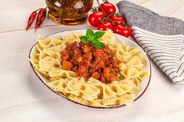 Italian pasta Farfalle Bolognese with meat