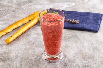 Sweet strawberry smoothie with milk