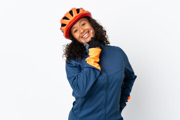Teenager cyclist woman isolated on white background happy and smiling