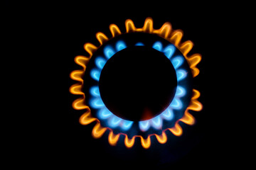 kitchen gas stove with blue and red  flame