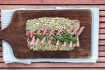 Raw rack of lamb with mint, basil and pine nuts pesto