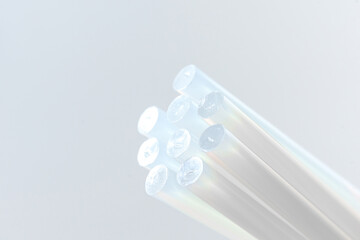 Glue sticks for a hot glue gun on a white background. tools for crafts and construction work.