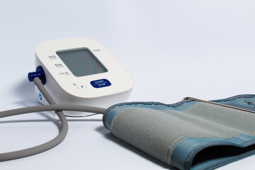 Blood pressure monitor on isolated white background