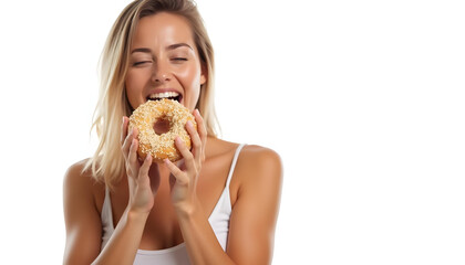 Delighted woman holding sesame donut, enjoying sweet treat with joyful expression