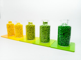 various colors of mastebatch granules in glass container with chips, colorful pigment virgin resin,...