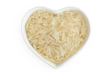 rice basmati in a ceramic bowl isolated on white background. Top view. Flat lay